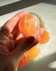 Peach Selenite Palm Stones