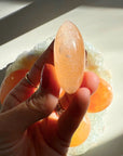 Peach Selenite Palm Stones